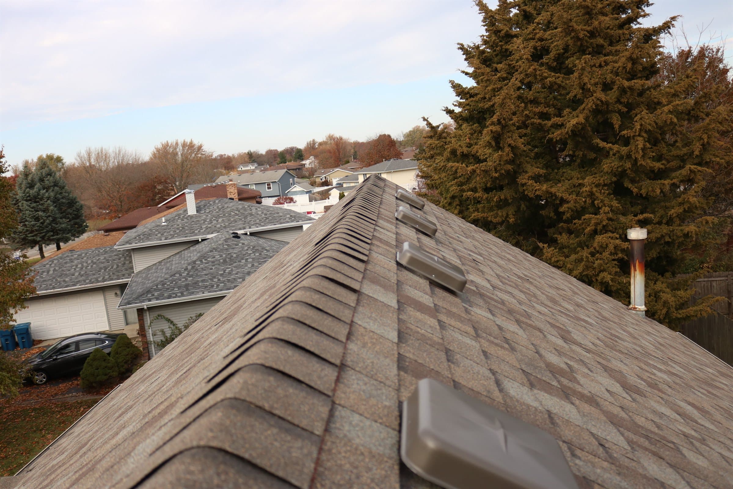 Close detail of finished ridge shingles on a completed Revere One roof